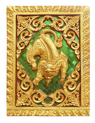 Fototapeta na wymiar golden sculptures on the wall in temple, Thailand