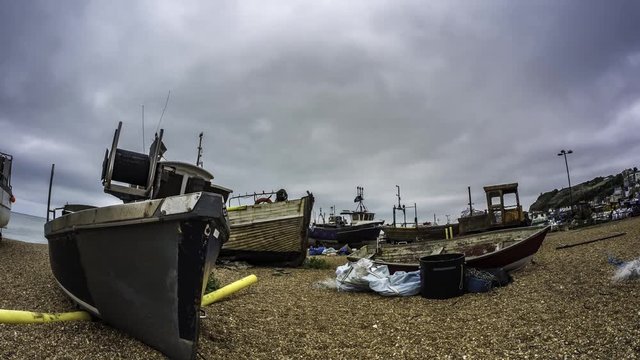Time lapse fish eye view of fishing boats on the beach at Hastings, England