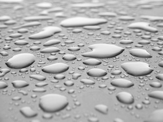 closeup drops of water on the car after rain