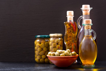  bottles of olive oil and preserved olives
