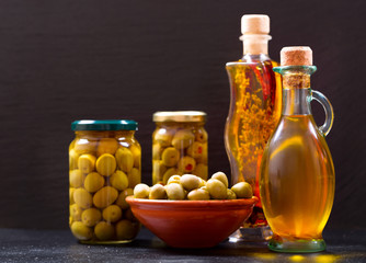  bottles of olive oil and preserved olives