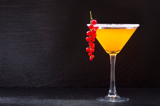 Orange Cocktail With Red Currant