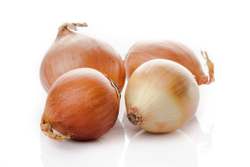 Ripe onion on a white background