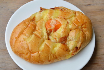 bread fill dried shredded pork and salt egg yolk on dish