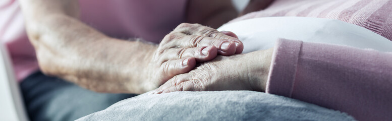 Fototapeta premium Man holding woman's hand