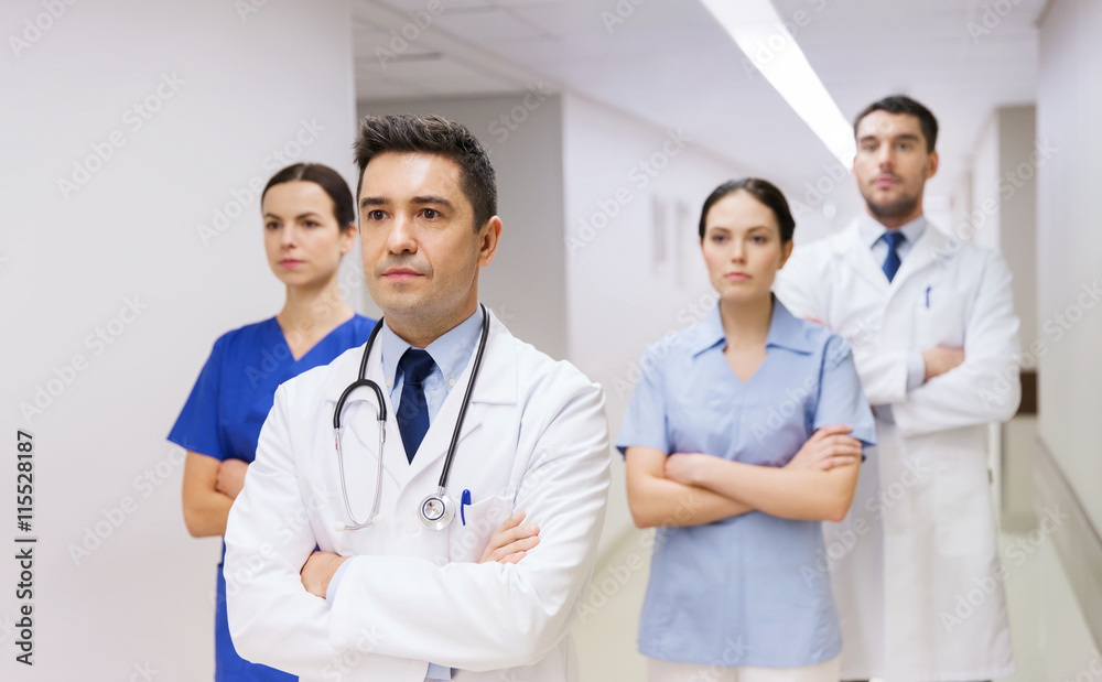 Wall mural group of medics or doctors at hospital