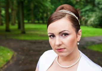 portrait of a bride in a city park