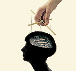 image of a hand, that manipulates the mind of another person, isolated and toned
