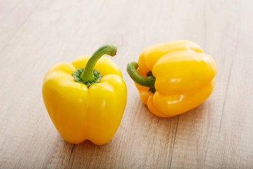 peppers on a wooden surface
