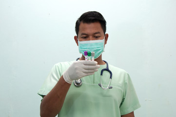 Laboratory Tech with Test Tube of Blood