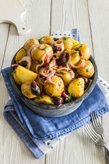 Rustic food: new potatoes, onions
