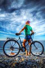Fototapeta premium girl with a bicycle