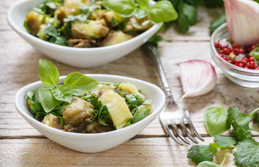 Salad of roasted eggplant with garlic, cilantro and Basil
