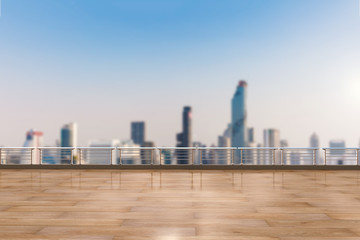 Obraz premium empty terrace on cityscape and blue sky background