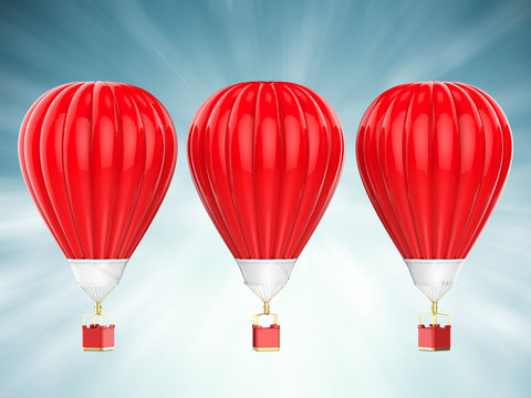 three red hot air balloons