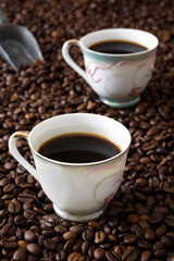 Coffee cup and coffee beans background

