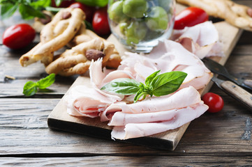Italian antipasto with chicken ham and bread