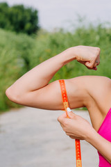 Running woman. Female Runner Jogging during Outdoor Workout in a Park.