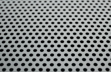 Metallic background with round holes