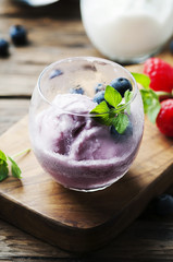 Ice cream with fresh berry and mint