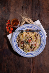 Spaghetti with minced meat zucchini and beans