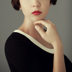 Old aristocracy concept. Close up portrait of posing young woman