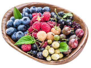 Berries in the wooden bowl.