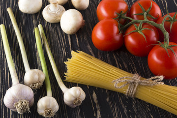 Ingredients. Tomatoes, pasta, garlic, basil and champignon.