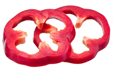 Two paprika rings isolated on white background.