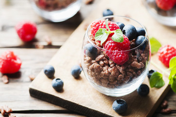 Breakfast with puffed rice and berry