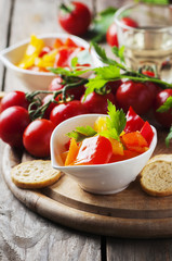 Italian sweet-sour paprika with bread and tomato