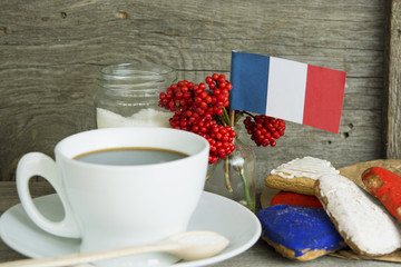 Patriotic Breakfast Concept - France flag, decoration color red, blue, sweets, miniature bucket with red berries. Concept - information holidays, dates and events Note for text