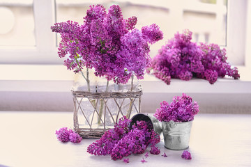 Lilac bouquet on white table