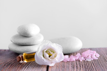 Spa composition with white stones on light background
