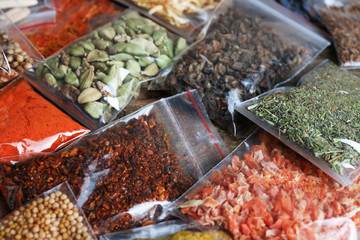 Different spices in plastic zipper bags