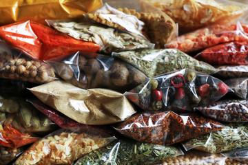 Different spices in plastic zipper bags