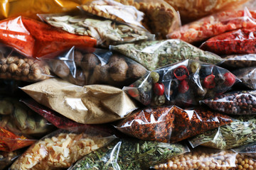 Different spices in plastic zipper bags