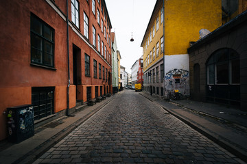Fototapeta na wymiar A narrow street, in Copenhagen, Denmark.