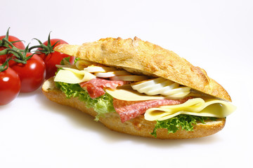 Baguette bun, salami, cheese, lettuce and boiled eggs