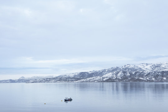 Sweden, Nordland, Salten, Saltstraumen, Fishing boat in tidal strait