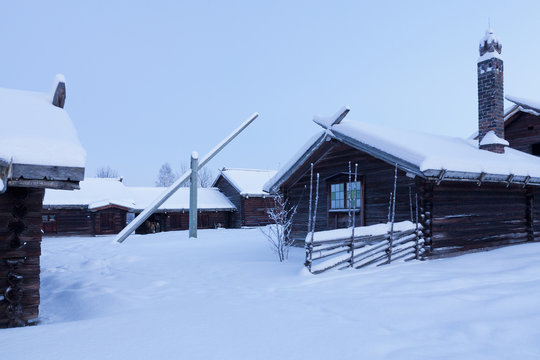 Sweden, Dalarna, Mora, Wooden houses covered with snow