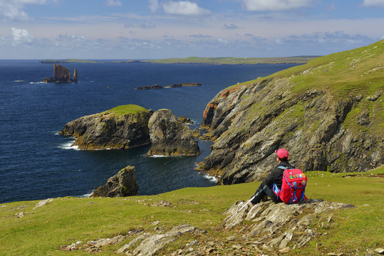 UK, Scotland, Shetland, West Sandwick, Hillswick, Senior woman looking at view