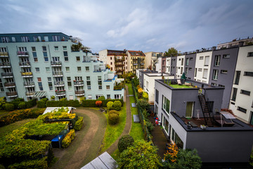 View of apartment buildings and a park in Berlin, Germany.