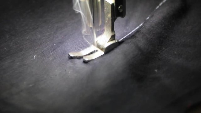 Professional sewing machine with black fabric