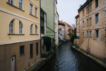 Fototapeta na wymiar Buildings along Certovka, in Prague, Czech Republic.