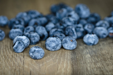 Blueberries on wood board