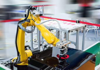 Fototapeta premium robotic hand machine tool at industrial manufacture factory