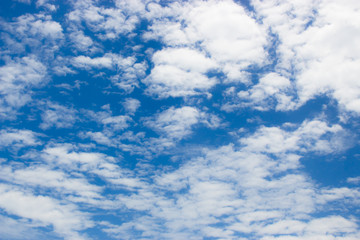 Blue sky clouds dim.