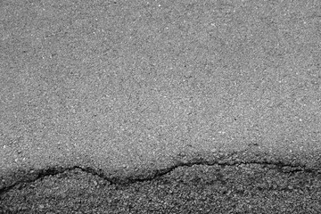 Cracked surface of an asphalt road
