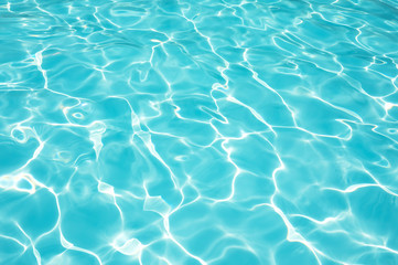 Obraz na płótnie Canvas Blue water surface in swimming pool